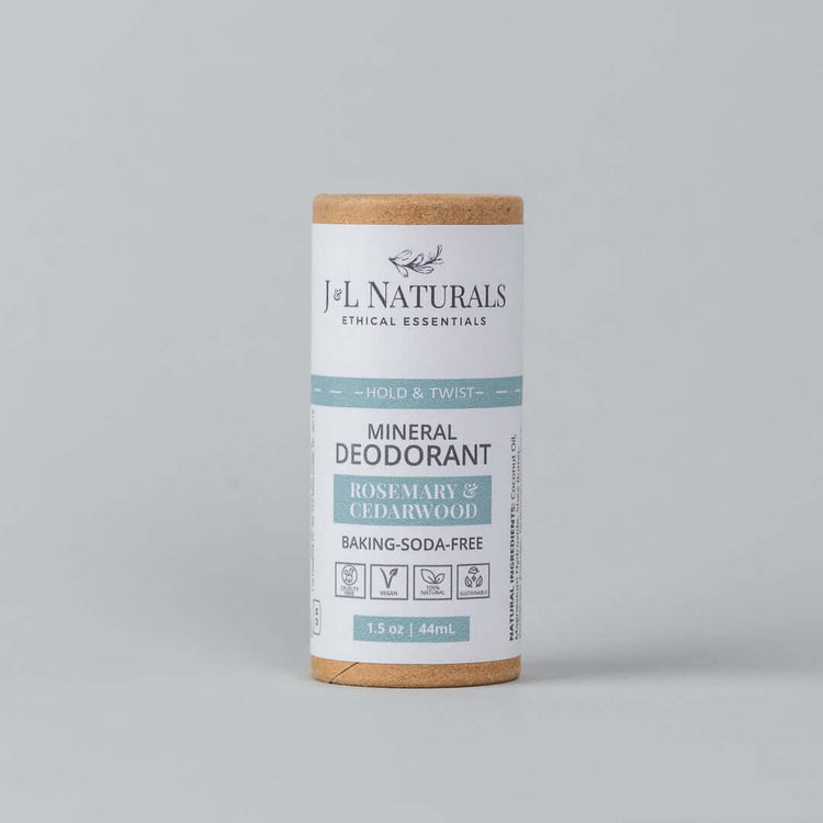 J&L Naturals baking soda-free mineral deodorant in Rosemary & Cedarwood, 1.5 oz tube.