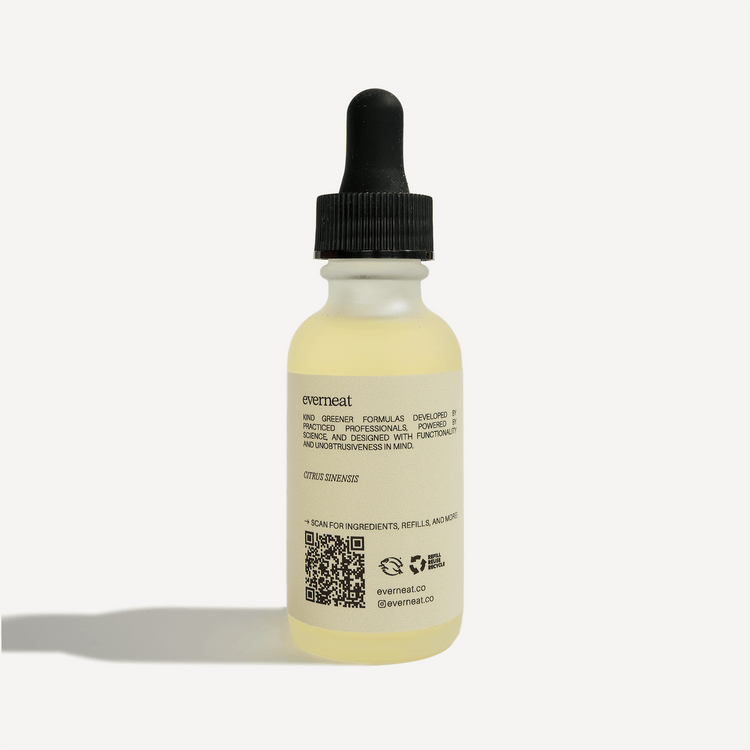 Bottle of Evermeat essential oil with dropper, featuring plant-based ingredients and refillable design.