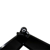 Close-up of a black metal planter wheel, showing the swivel caster for easy mobility.