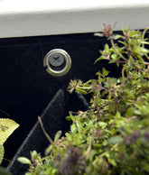Close-up of the waterproof lining and drainage grommet in a 5 pocket indoor/outdoor eco-friendly planter.