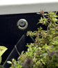 Close-up of the waterproof lining and drainage grommet in a 5 pocket indoor/outdoor eco-friendly planter.