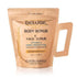 Deluge Vitamin C Scrub with dried orange peel, dead sea salt, honey, and jojoba oil for face and body skincare.