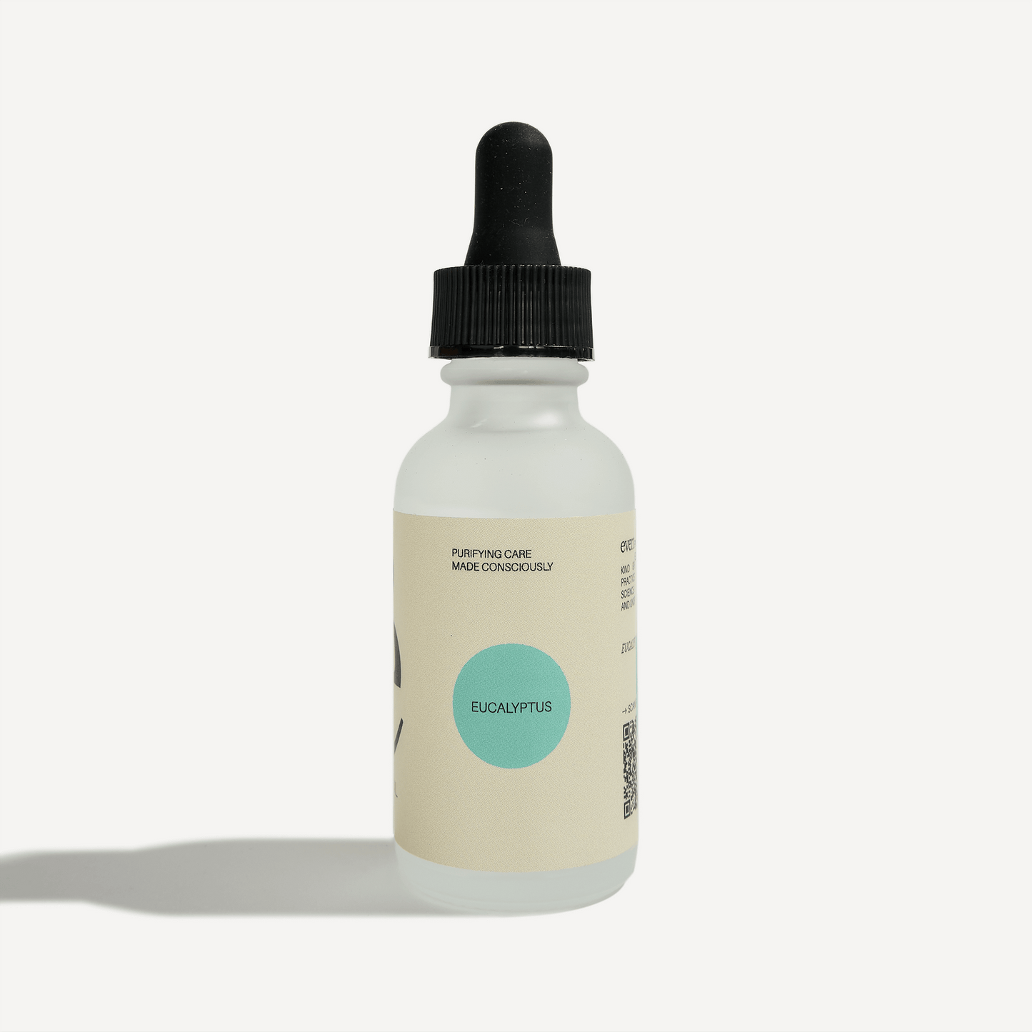 Eucalyptus Essential Oil bottle with dropper, showcasing plant-based, vegan, and cruelty-free ingredients.