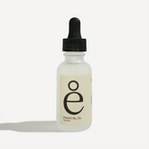 Rosemary essential oil bottle with dropper, featuring eco-friendly packaging and clear labeling.