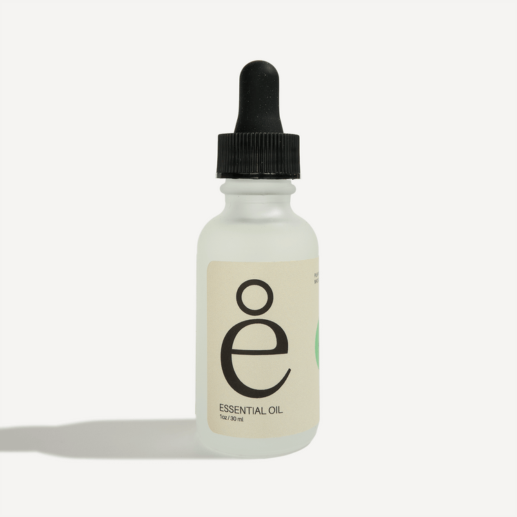 Rosemary essential oil bottle with dropper, featuring eco-friendly packaging and clear labeling.