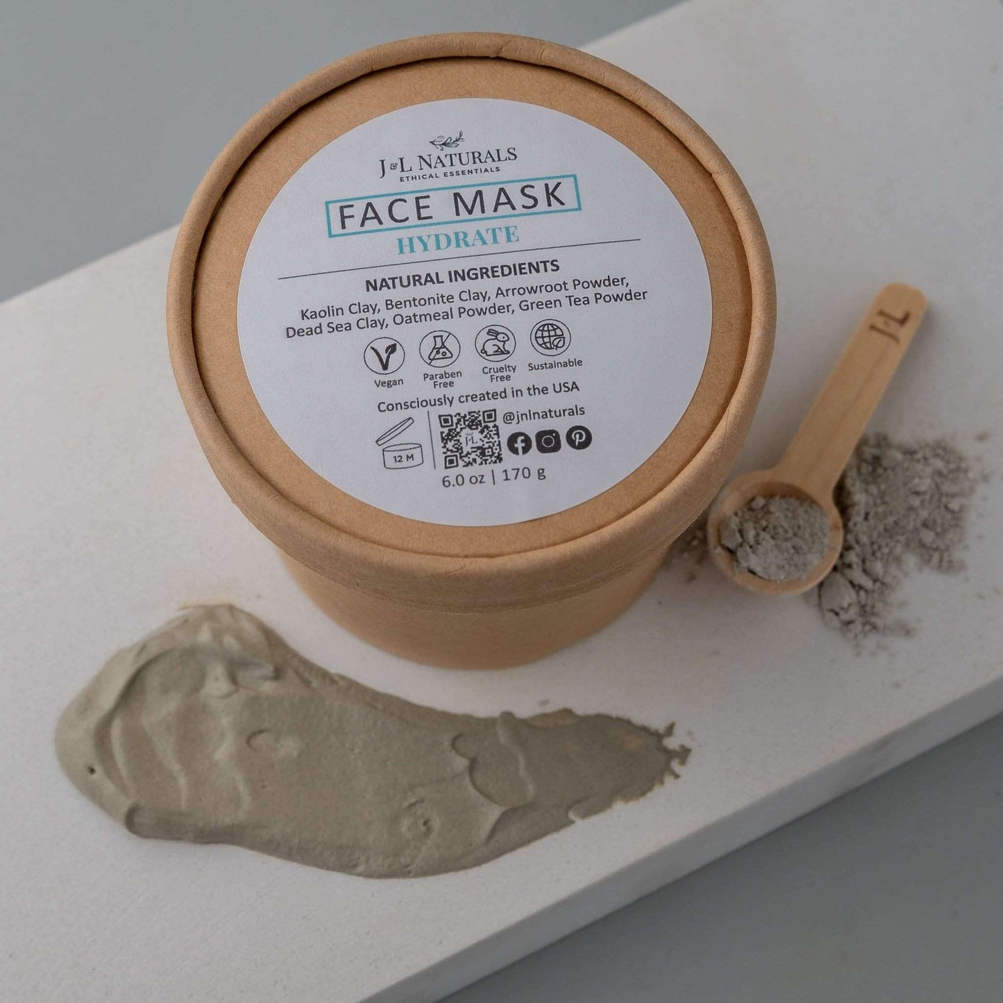 Hydrating face mask with natural ingredients including clay and powders for a smooth complexion.