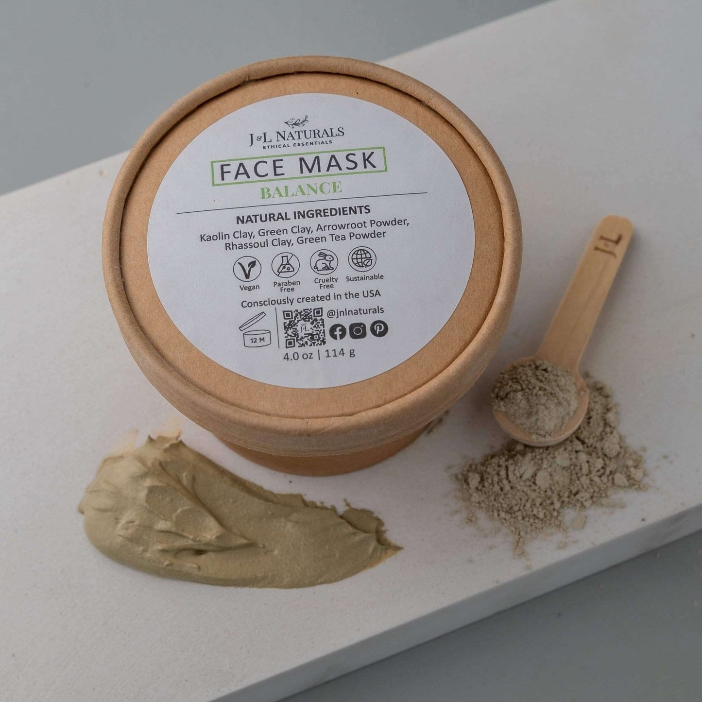 Face mask jar with natural ingredients for oily skin, showing clay and a wooden scoop.