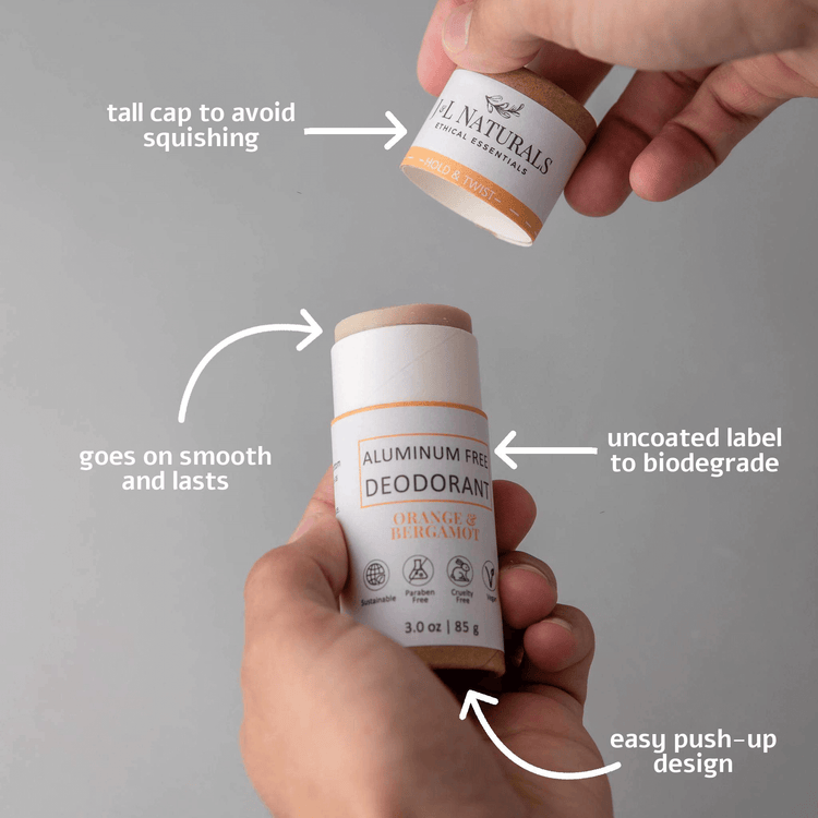 Hands holding aluminum-free deodorant tube with biogradable label, showcasing its push-up design and tall cap feature.