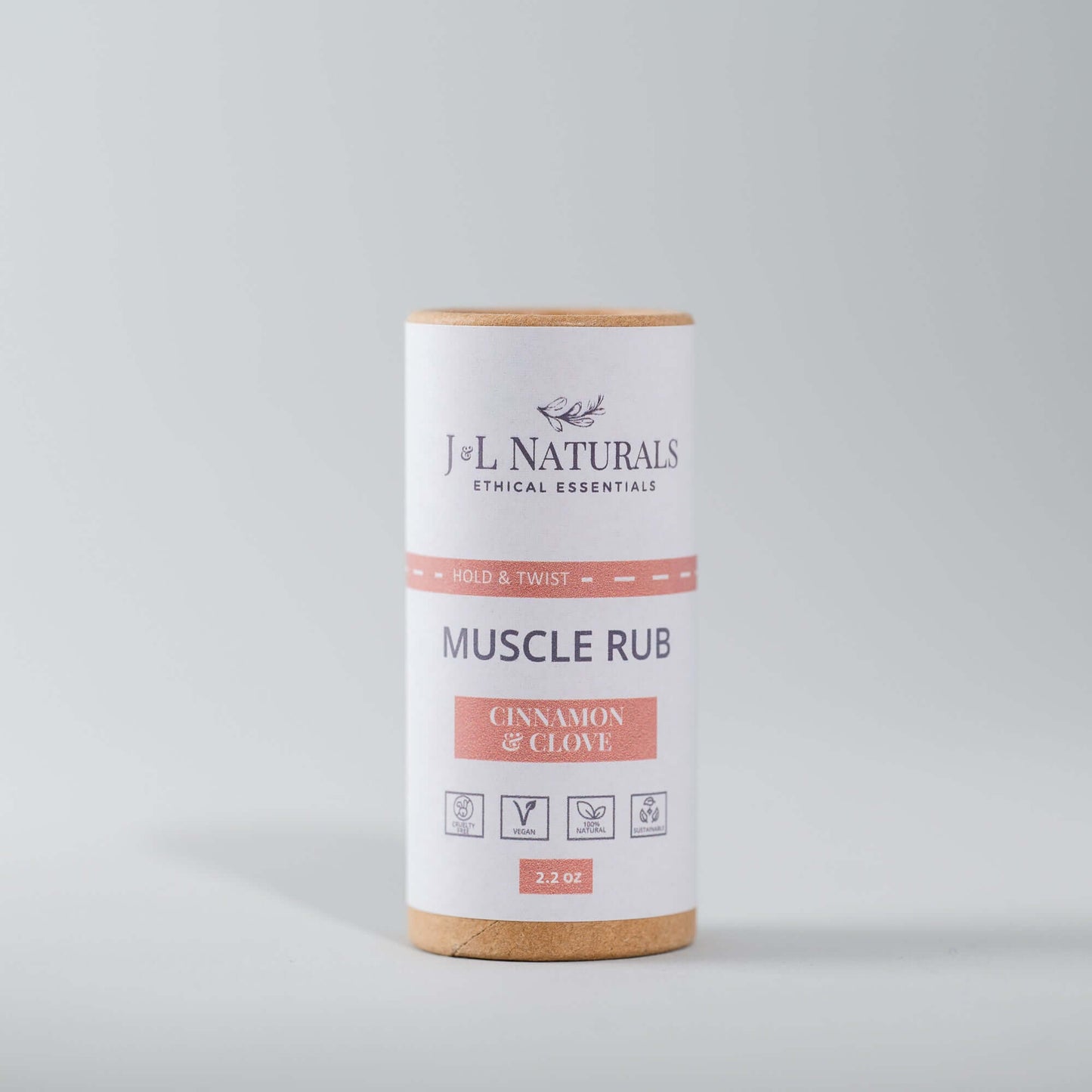 Muscle Rub in a push-up tube with cinnamon and clove, designed for muscle and joint relief, 2.2 oz.