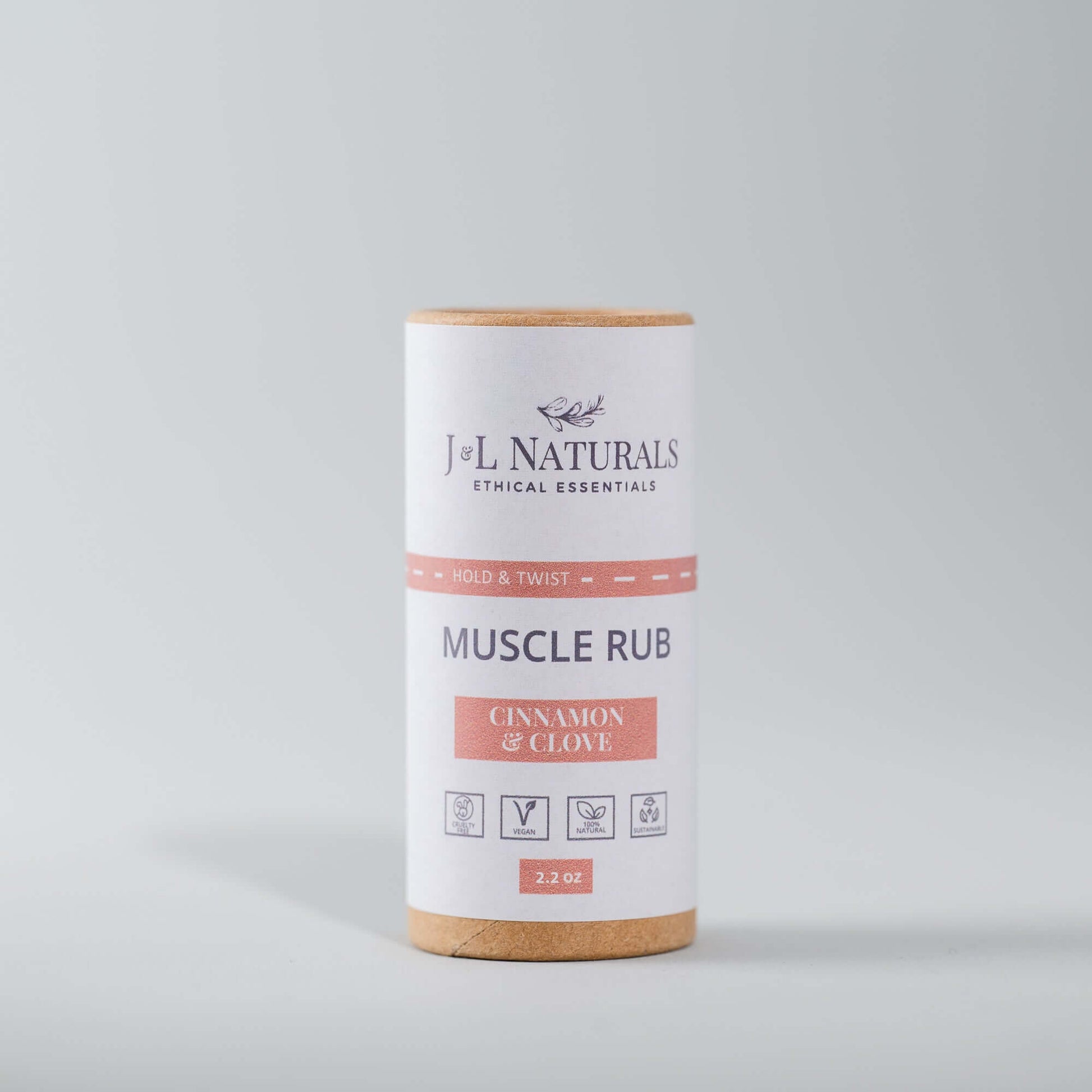 Muscle Rub in a push-up tube with cinnamon and clove, designed for muscle and joint relief, 2.2 oz.