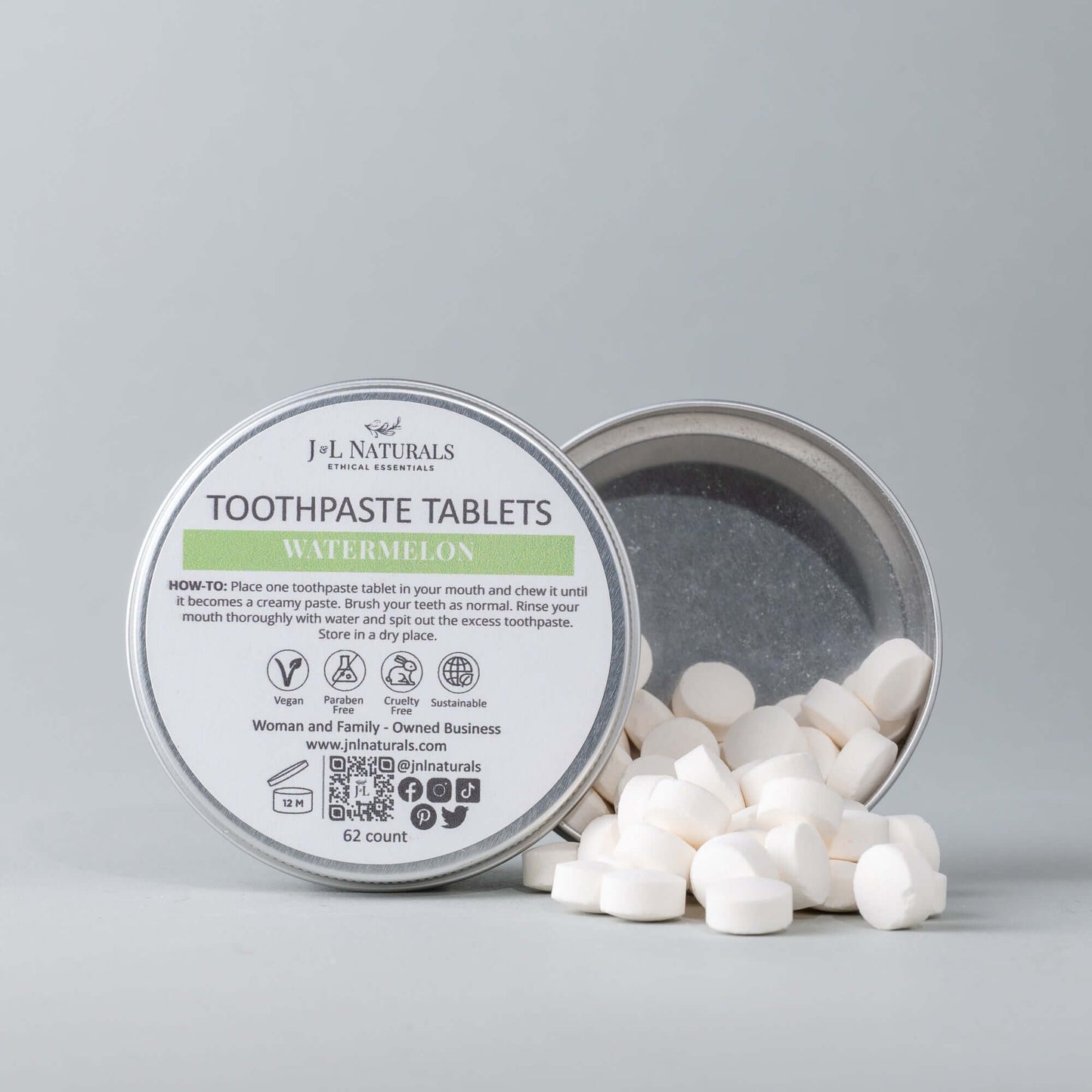 Eco-friendly toothpaste tablets in a watermelon flavor, packed in a tin with 62 tablets for natural dental hygiene.