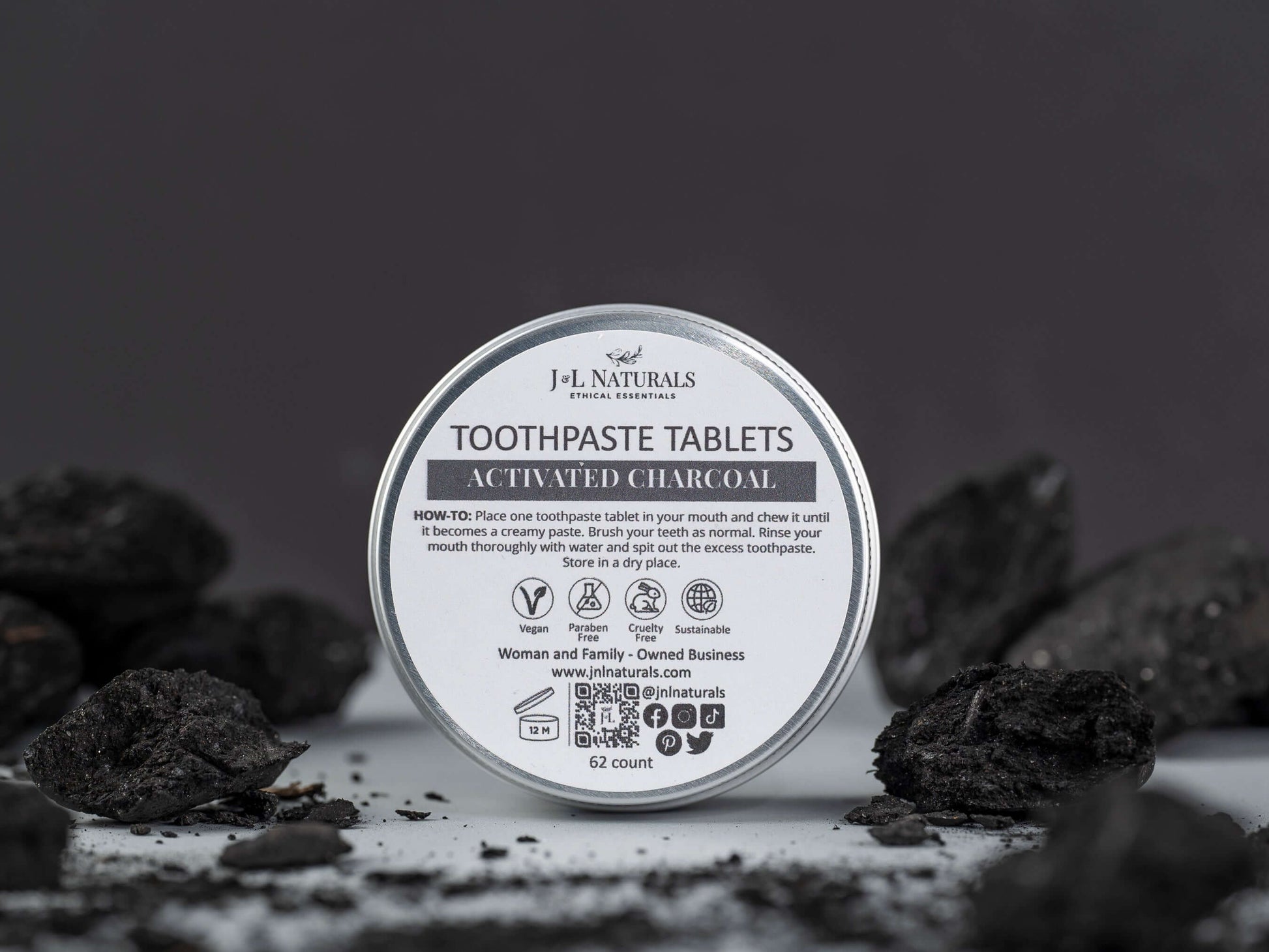 Eco-friendly toothpaste tablets with activated charcoal, 62 count, by J-L Naturals, perfect for sustainable dental care.