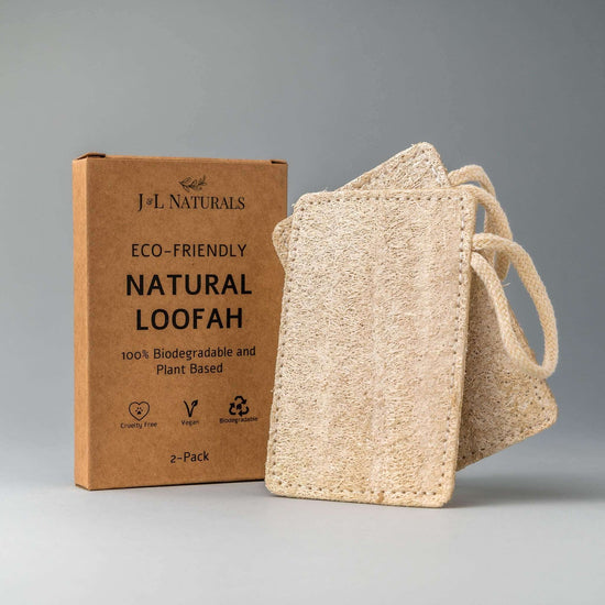 Natural Loofah Pad 2-Pack in eco-friendly packaging, 100% biodegradable and plant-based for skin exfoliation.