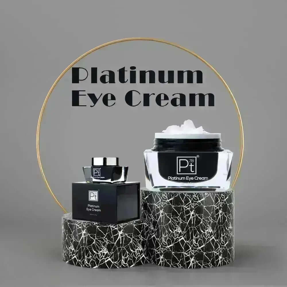 Platinum Eye Cream featuring two jars on a stylish marble display for boosting moisture and reducing fine lines.