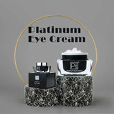 Platinum Eye Cream featuring two jars on a stylish marble display for boosting moisture and reducing fine lines.