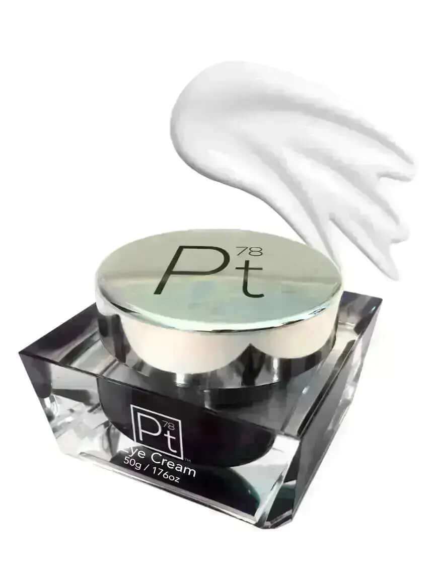 Platinum Deluxe Eye Cream jar with cream swirl, enhances moisture and reduces fine lines for a youthful look.