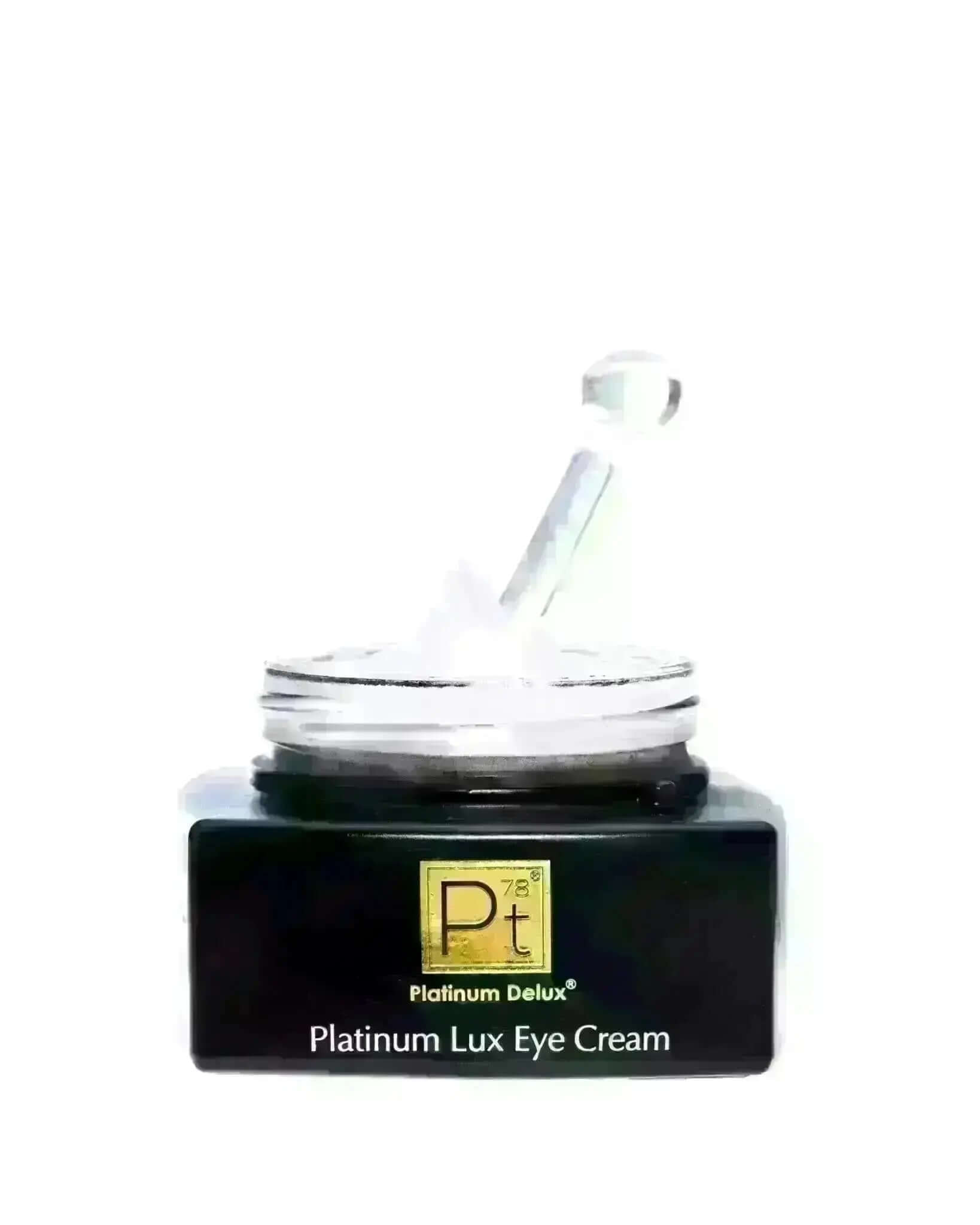 Platinum Lux Eye Cream jar with applicator, luxurious anti-aging eye treatment to rejuvenate tired skin.