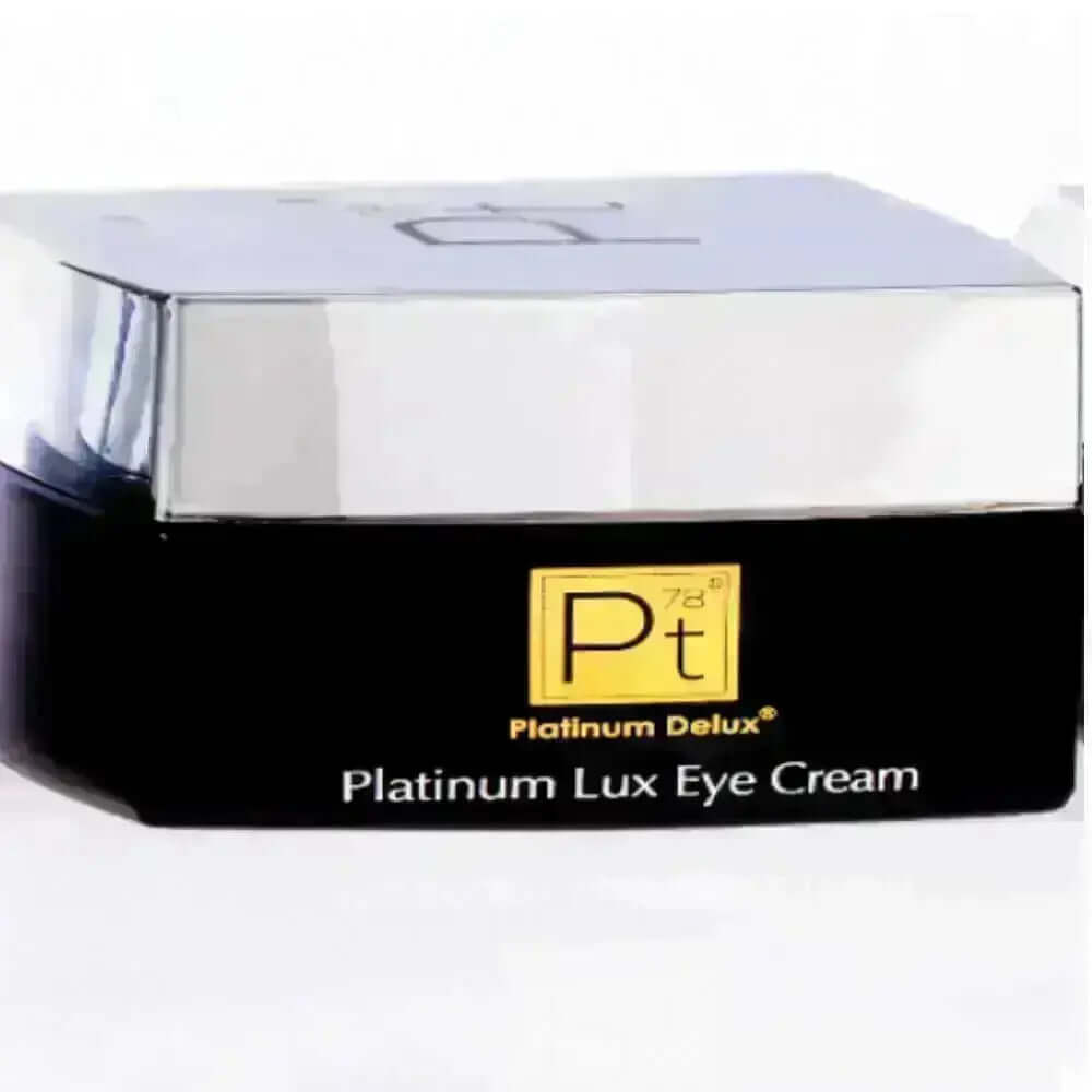 Platinum Lux Eye Cream jar with sleek silver lid for repairing tired under-eye skin and reducing fine lines.