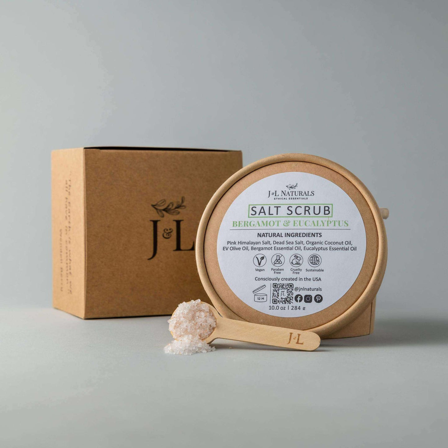 Salt Scrub with Bergamot & Eucalyptus in eco-friendly packaging, showcasing natural exfoliating ingredients.