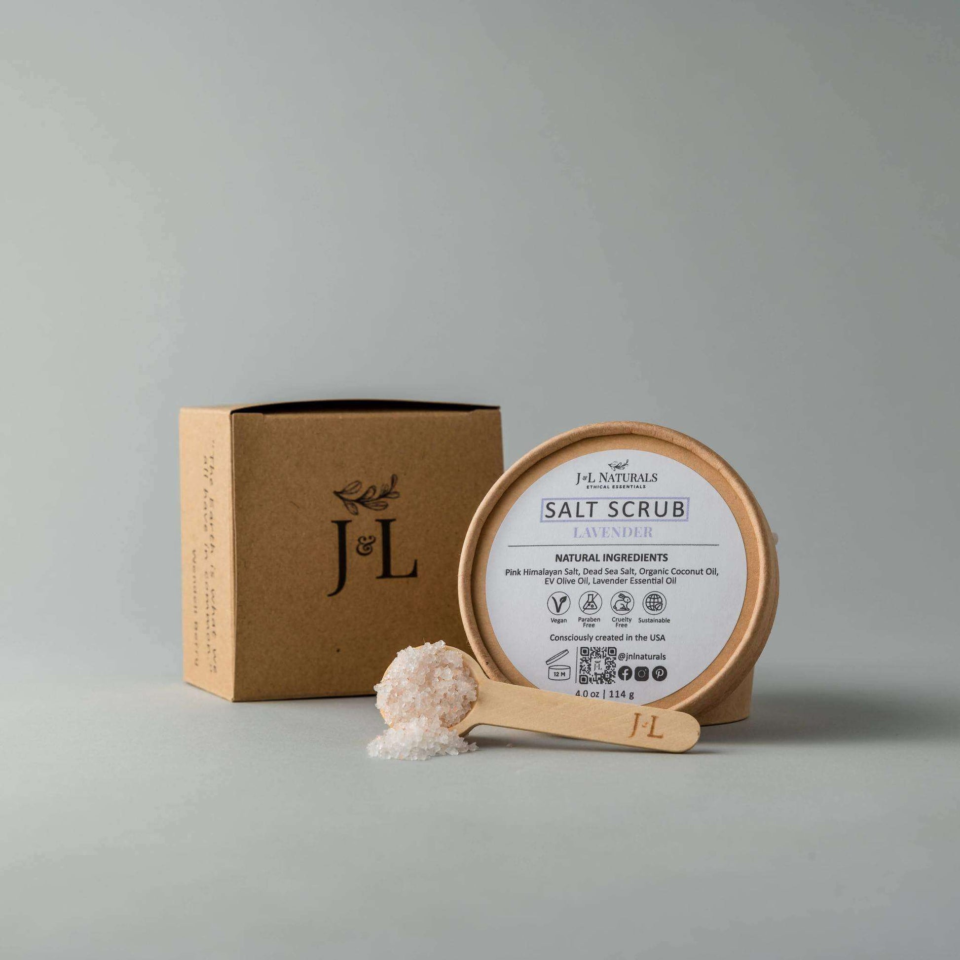 Salt Scrub with lavender scent, natural ingredients, and a wooden scoop, shown with packaging.