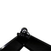 Close-up of a black metal planter wheel, showing the swivel caster for easy mobility.