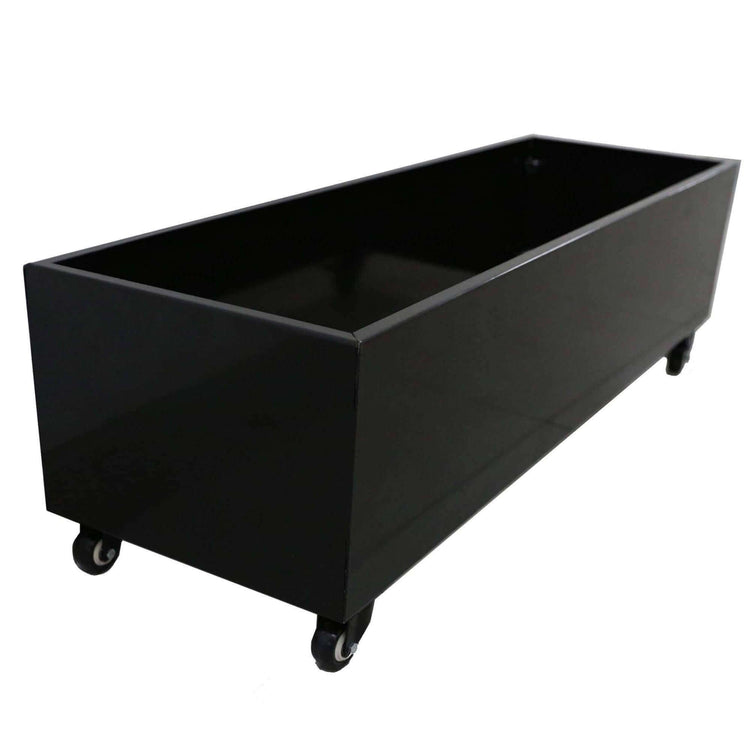 Black metal planter on wheels, 110cm long, perfect for designer plants and artificial hedges.