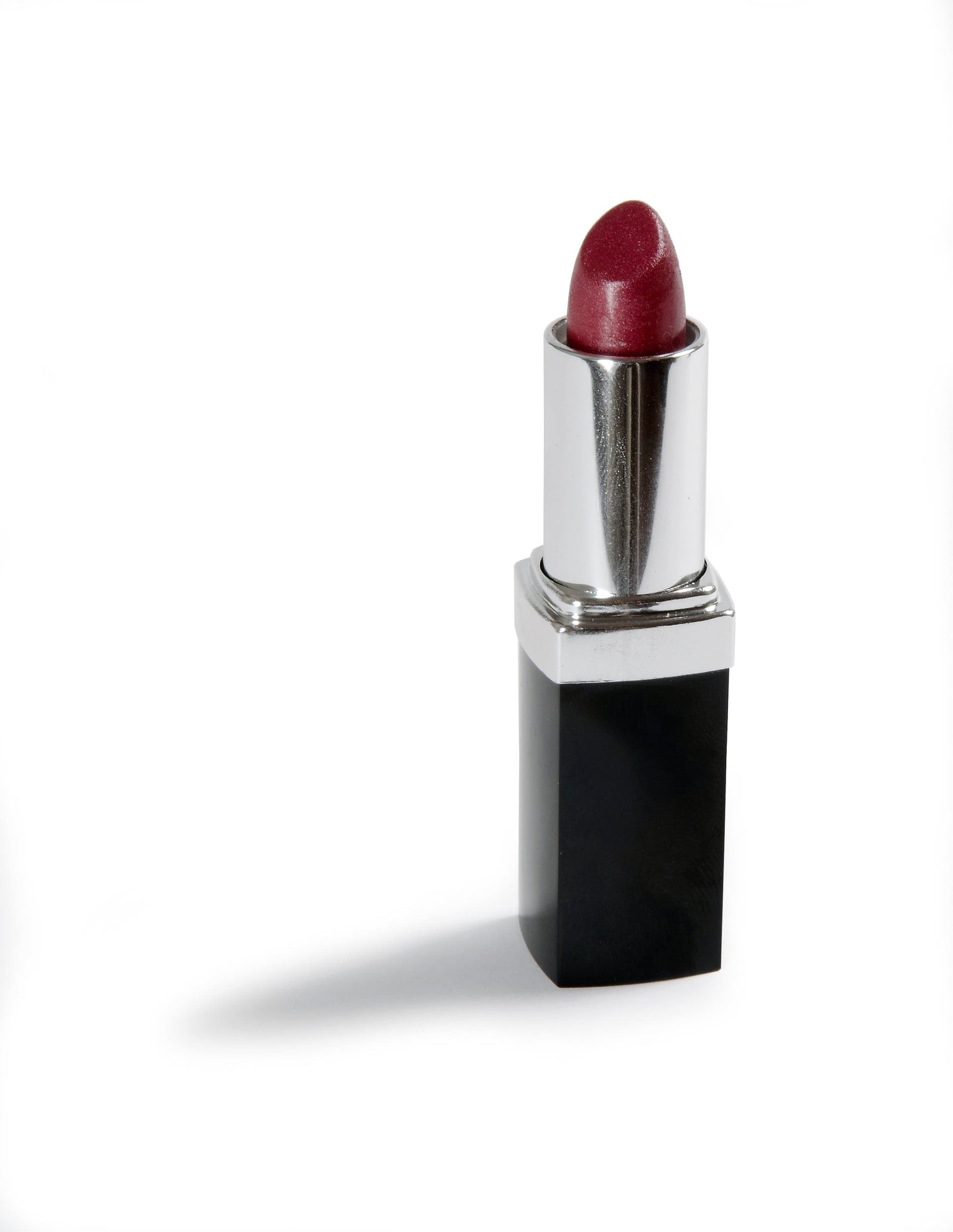 Danyel Cosmetics lipstick in a sleek black case, showcasing vivid color and a blend-able, long-lasting formula.