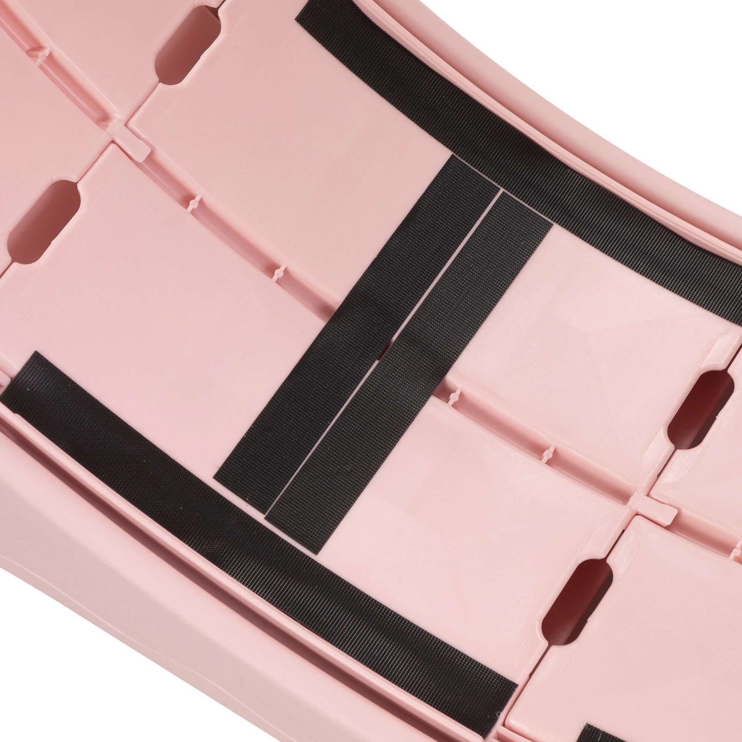 Close-up of pink cat running wheel showing smooth surface and secure locking straps for safety.