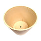 Inside view of a 40cm imitation stone garden pot in cream, showcasing durable recycled materials.