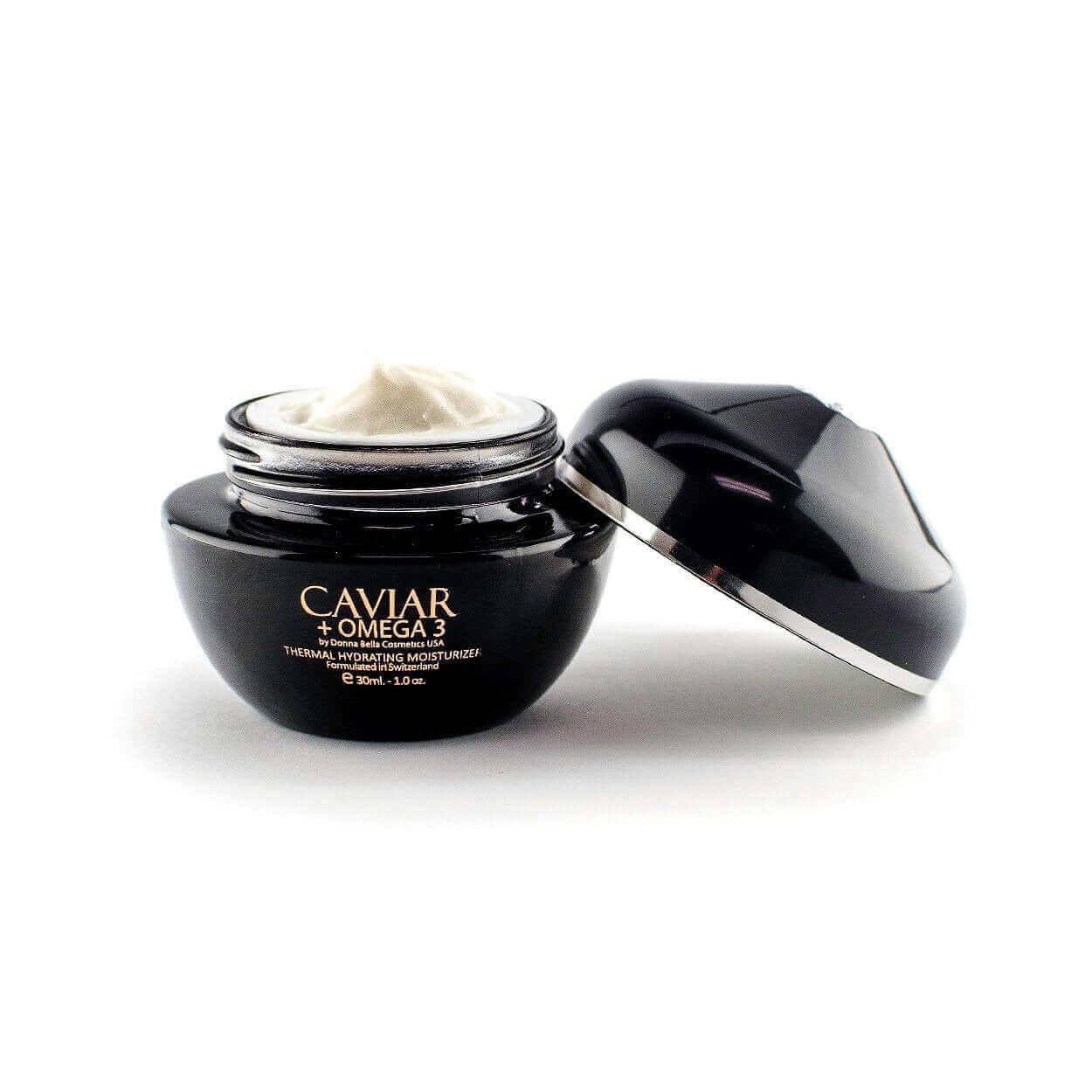 Caviar + Omega 3 Thermal Hydrating Moisturizer in a sleek black jar with cream texture visible.