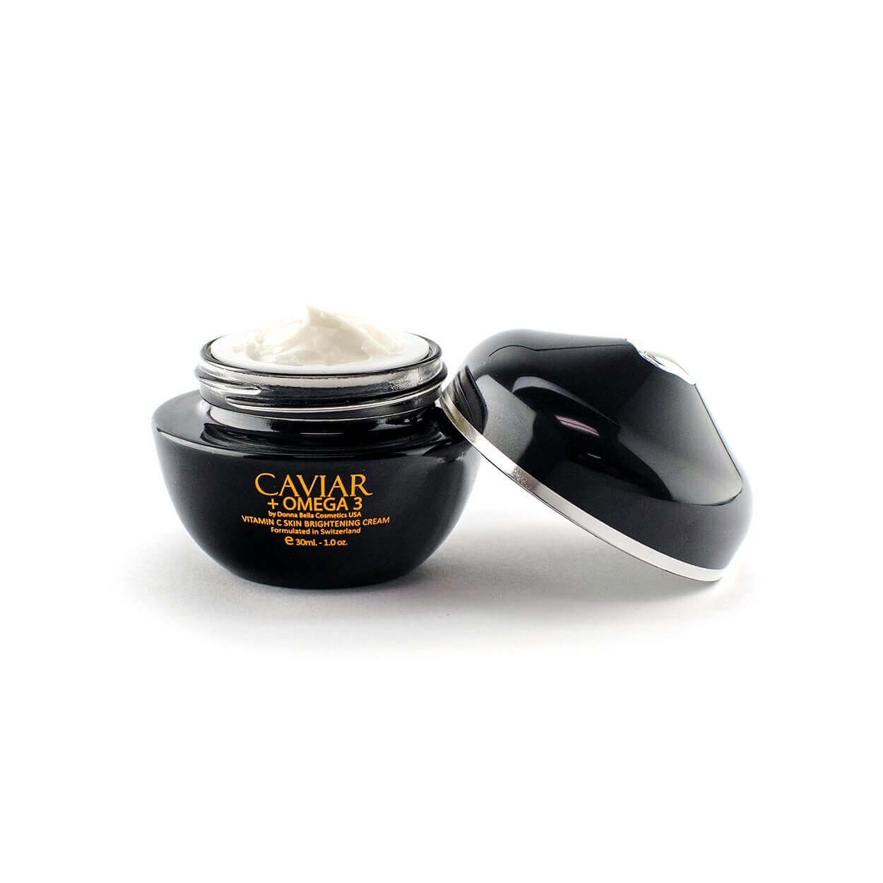 Vitamin C Skin Brightening Cream in a stylish black jar, featuring caviar and omega 3 for improved hydration and skin tone.