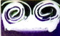 Lilac Breeze Bar Soap with purple and white swirls, showcasing organic ingredients for moisturizing benefits.