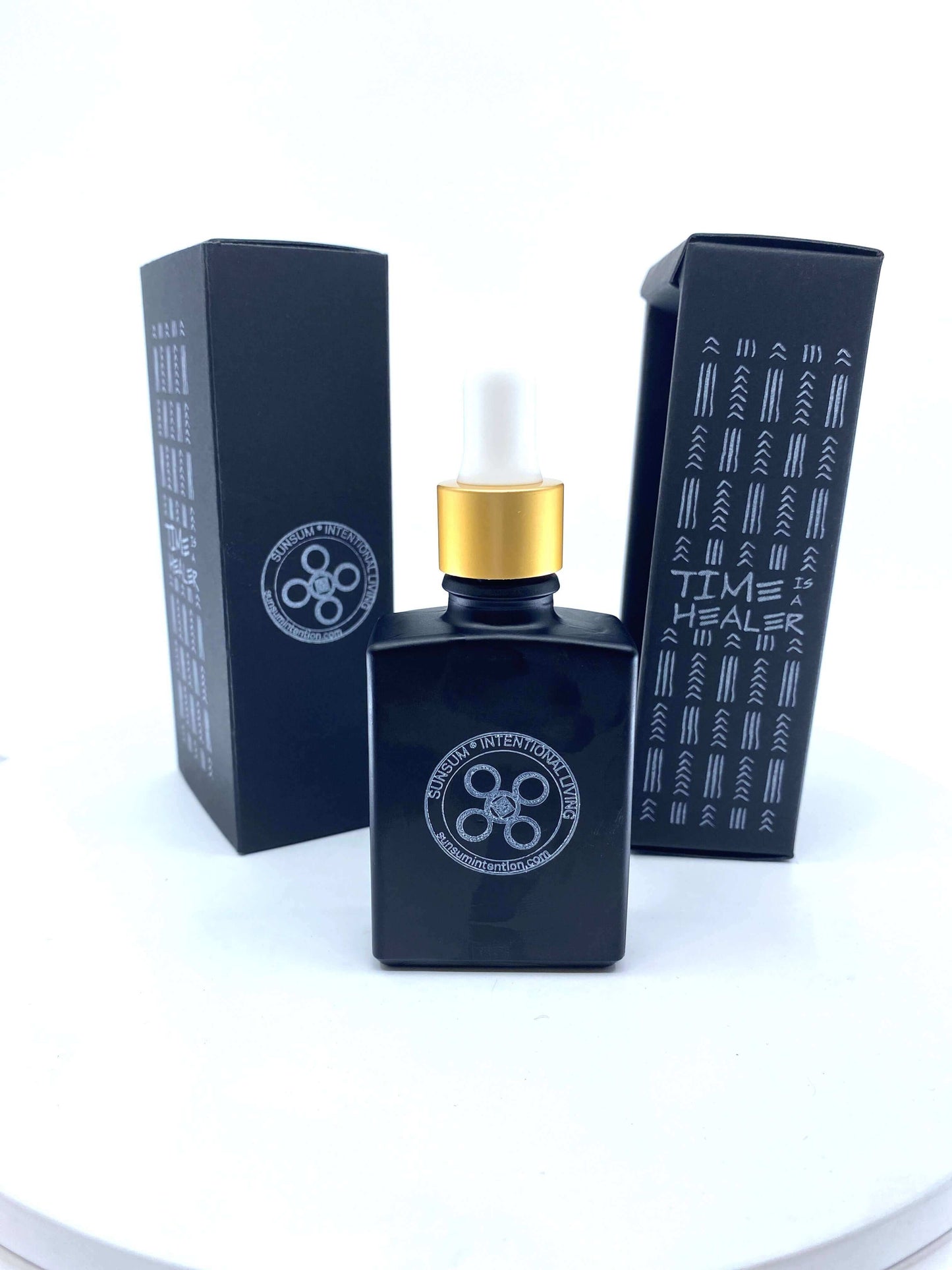 Time Is a Healer personal fragrance bottle, 30 ml, in elegant black packaging, designed for wellness and healing.