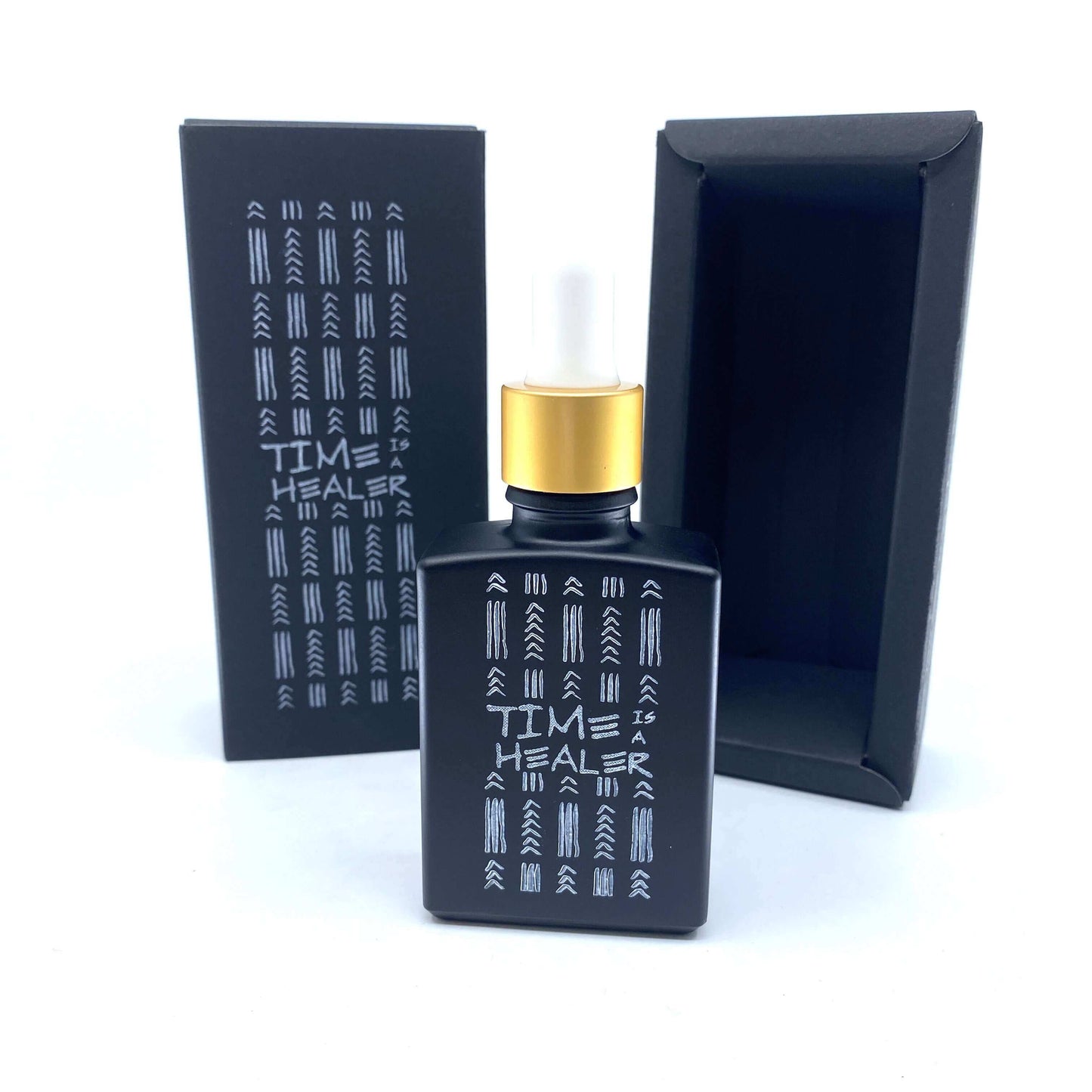 Time Is a Healer personal fragrance 30 ml in black bottle with gold cap, stylish packaging, non-toxic body oil.