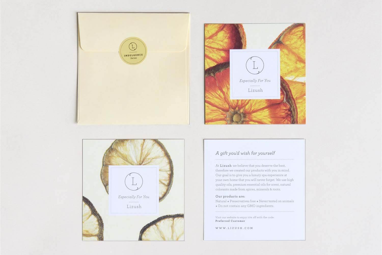 Handmade gift cards in an envelope featuring dried citrus designs and personalized message for special occasions.