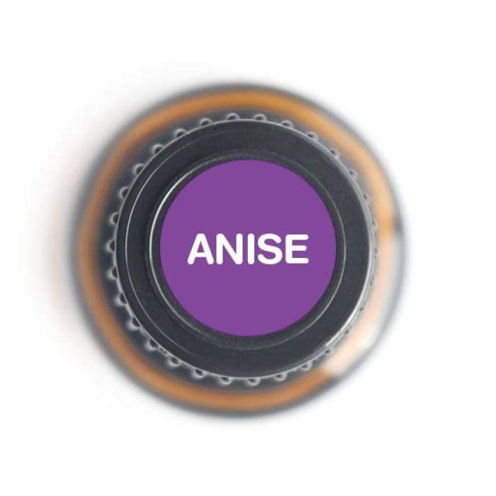 Top view of a bottle cap labeled 'ANISE' showcasing pure essential oil for digestion and wellness.