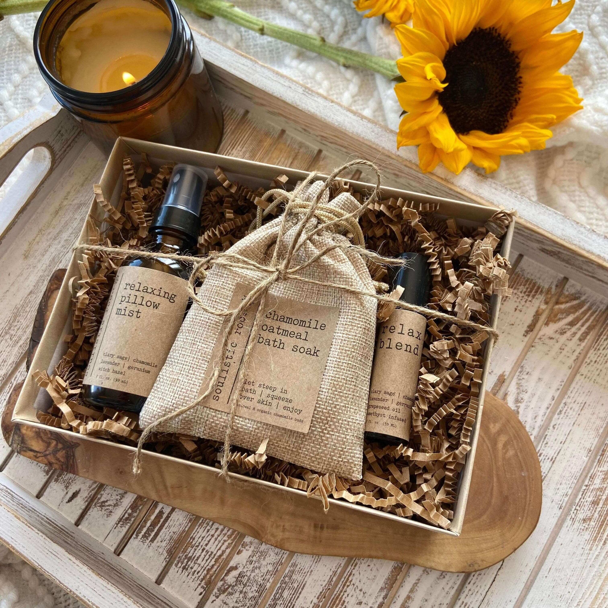 Relax Gift Set featuring relaxing pillow mist, chamomile oatmeal soak, and essential oils, perfect for ultimate relaxation.